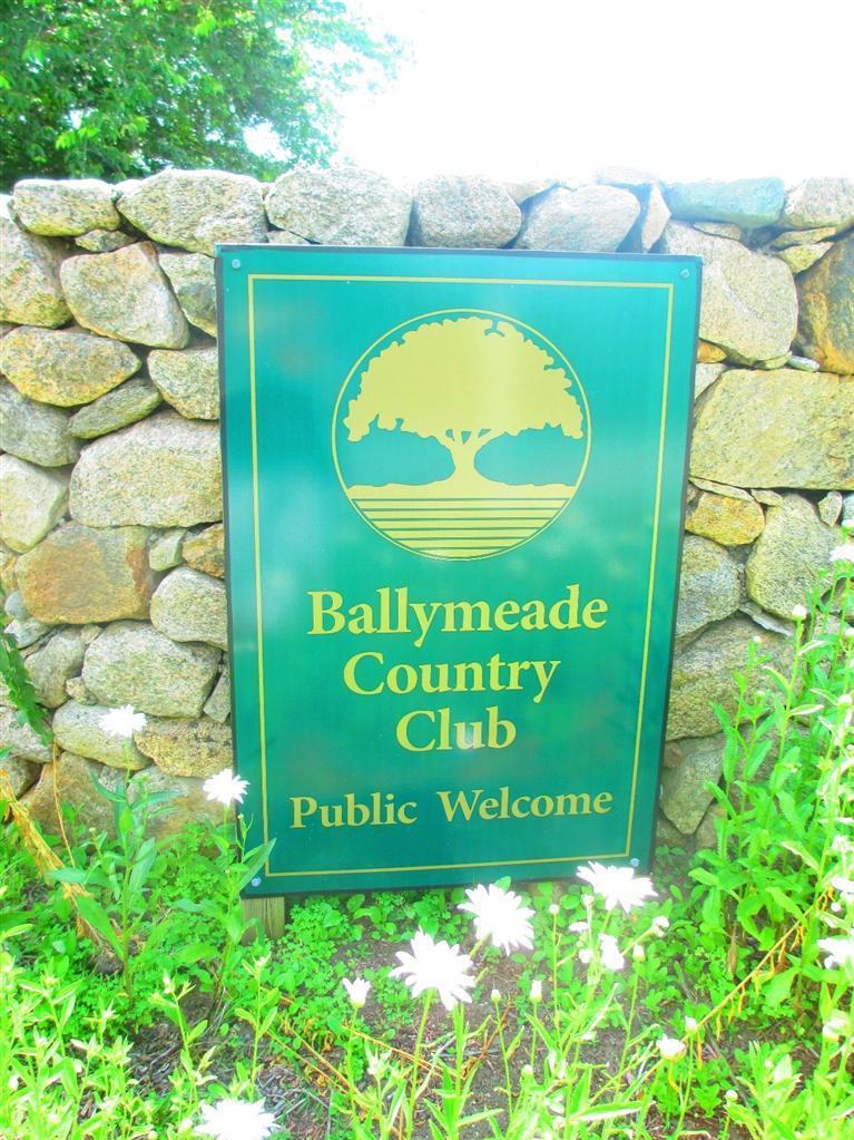 95 Cairn Ridge Road East Falmouth, MA 02536 - Photo 22 of 33 a sign that is sitting on a wooden wall