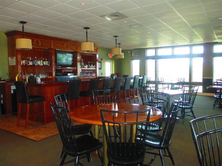 95 Cairn Ridge Road East Falmouth, MA 02536 - Photo 30 of 33 a view of a dining room with furniture window and outside view