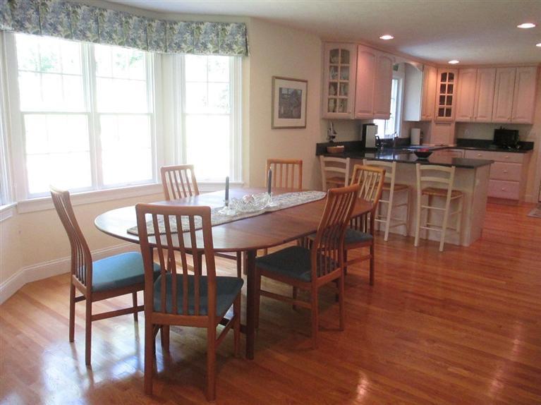 95 Cairn Ridge Road East Falmouth, MA 02536 - Photo 8 of 33 a dining room with furniture window and wooden floor