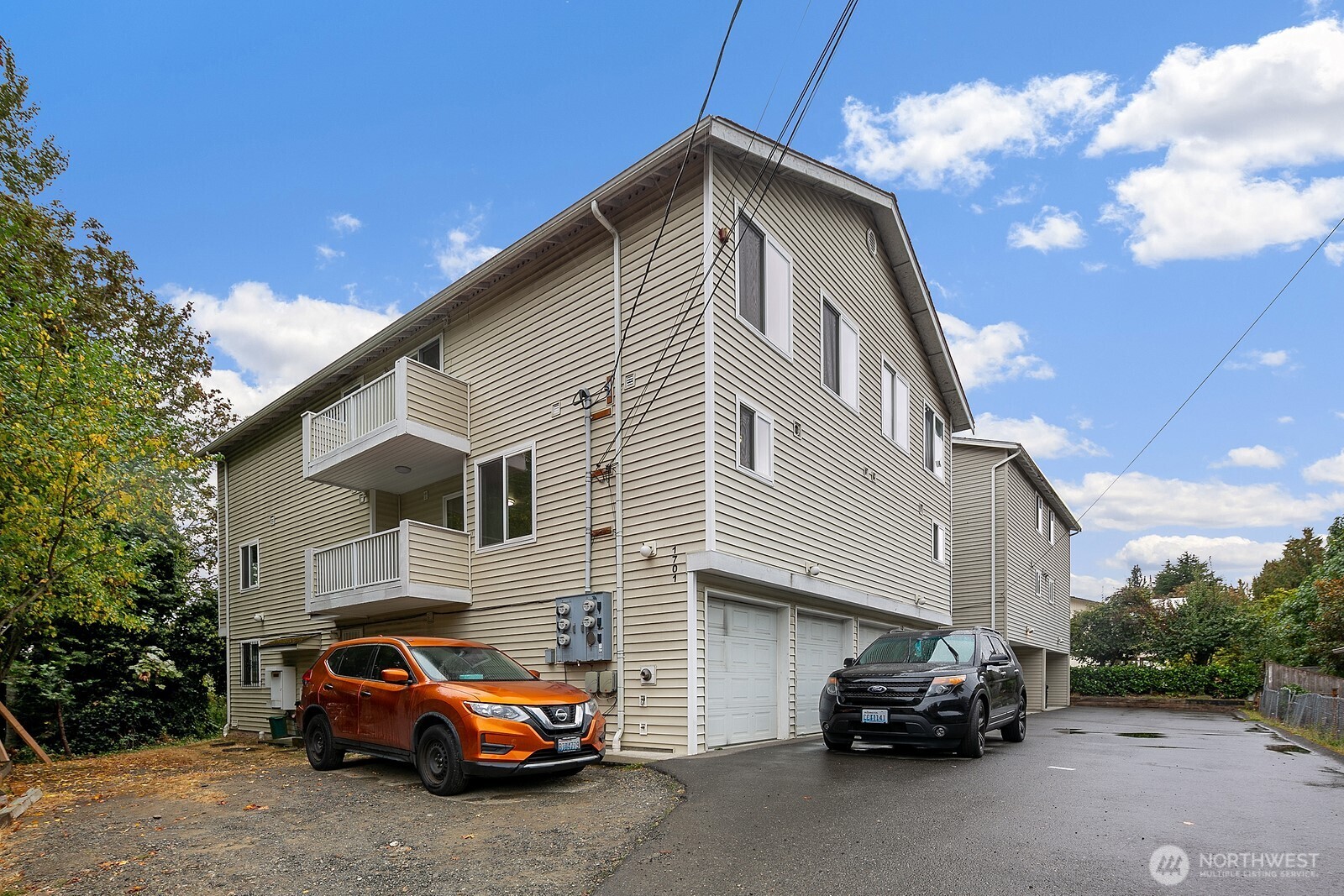 1701 16th Avenue South, Unit C Seattle, WA 98144 - Photo 1 of 27 a car parked in front of a house