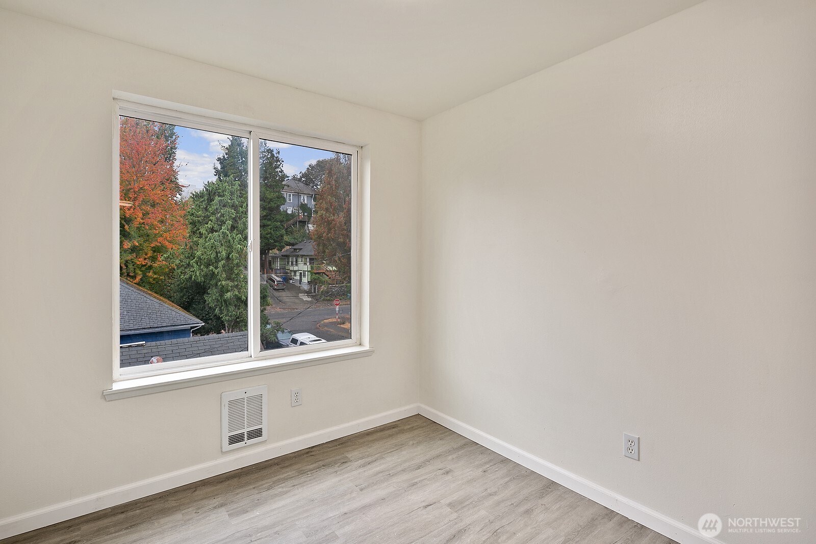 1701 16th Avenue South, Unit C Seattle, WA 98144 - Photo 22 of 27 a view of an empty room with a window