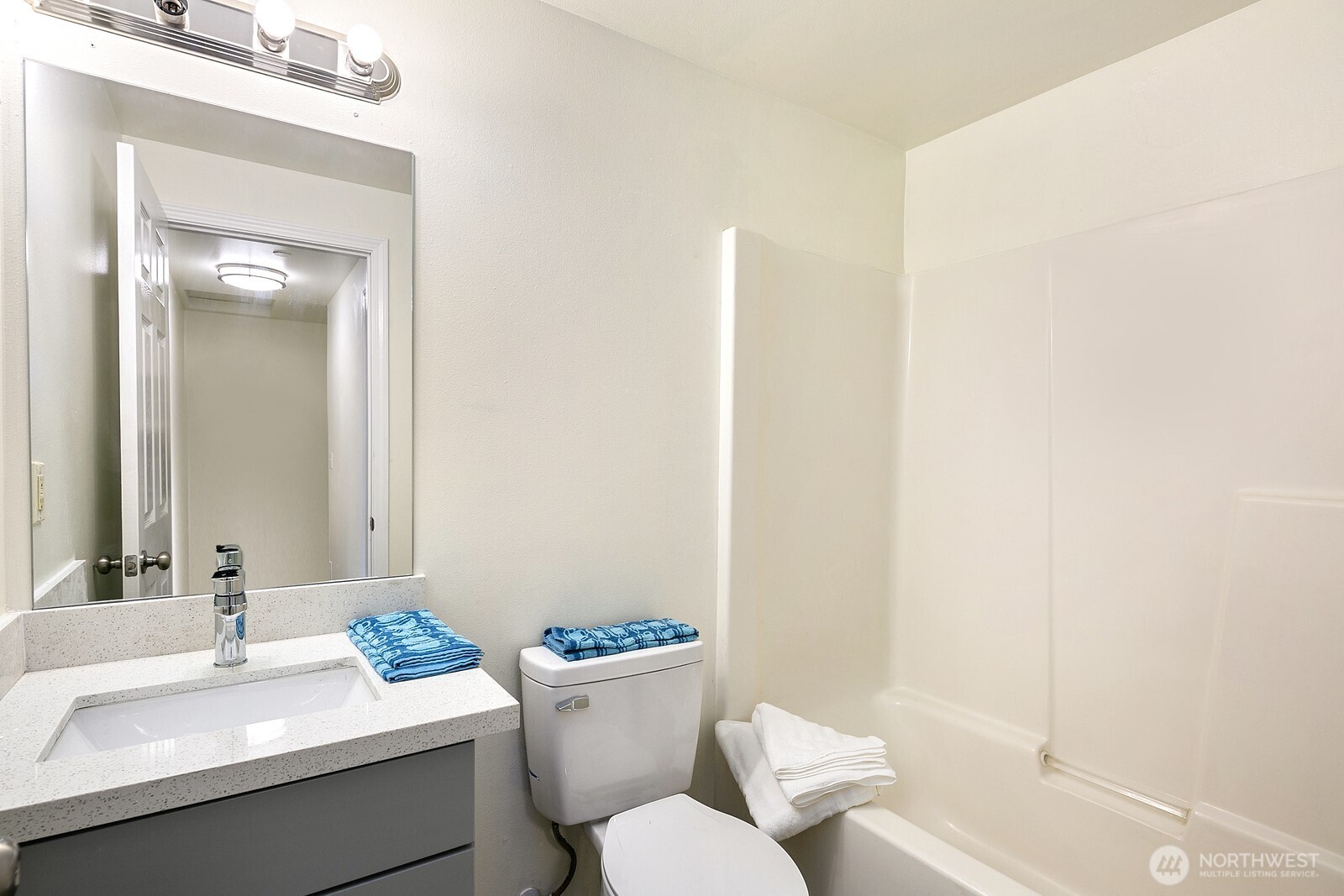 1701 16th Avenue South, Unit C Seattle, WA 98144 - Photo 23 of 27 a bathroom with a sink and a mirror