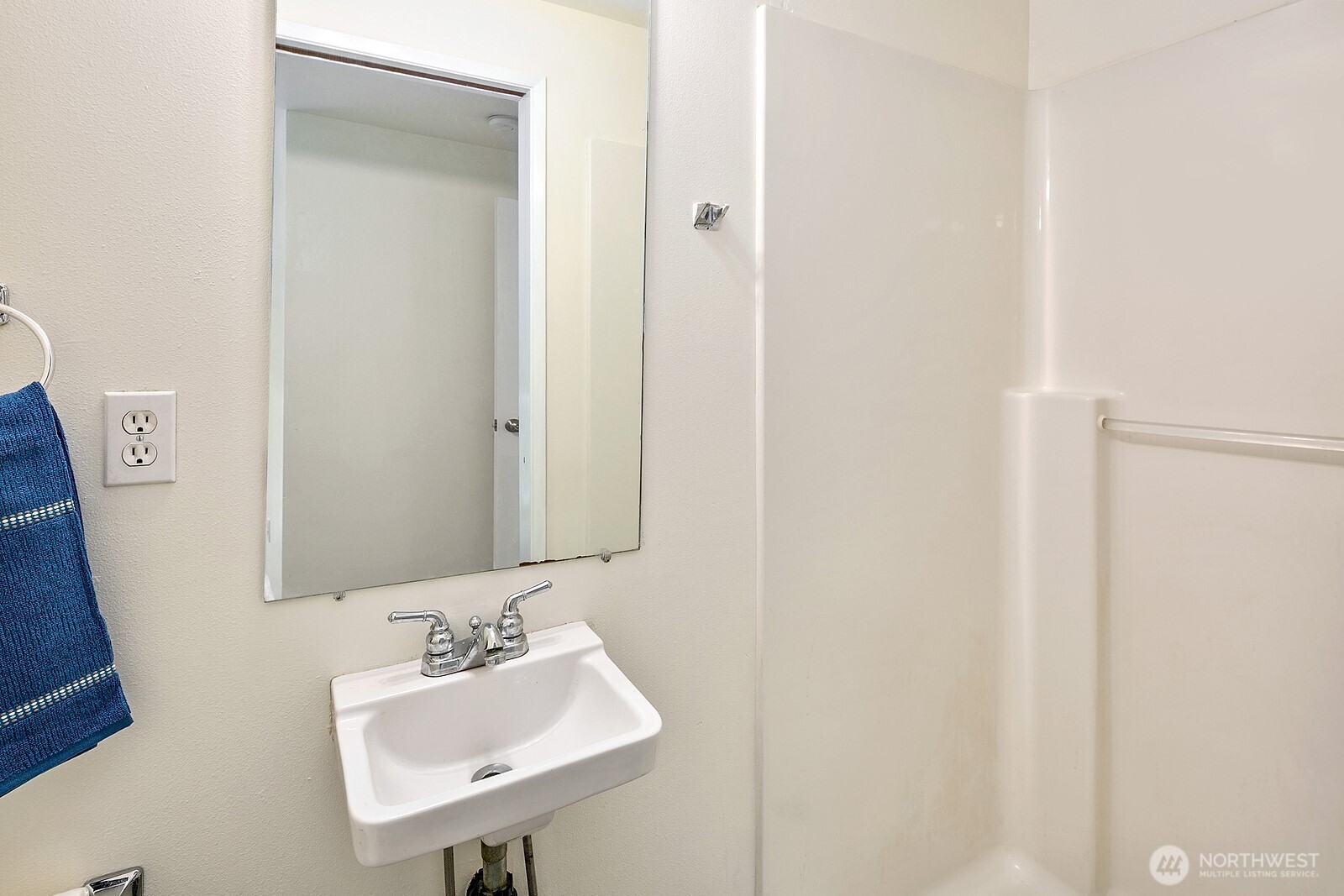 1701 16th Avenue South, Unit C Seattle, WA 98144 - Photo 27 of 27 a bathroom with a sink and a mirror