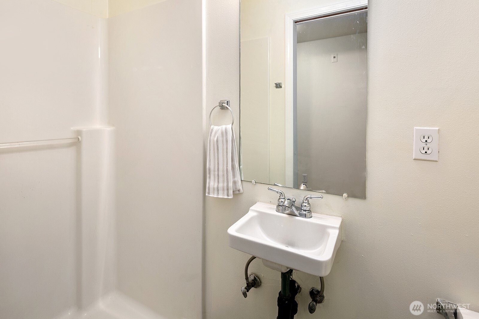 1701 16th Avenue South, Unit C Seattle, WA 98144 - Photo 6 of 27 a bathroom with a sink and a mirror