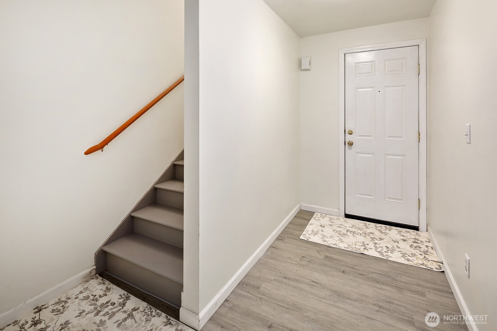 1701 16th Avenue South, Unit C Seattle, WA 98144 - Photo 8 of 27 a view of entryway with wooden floor