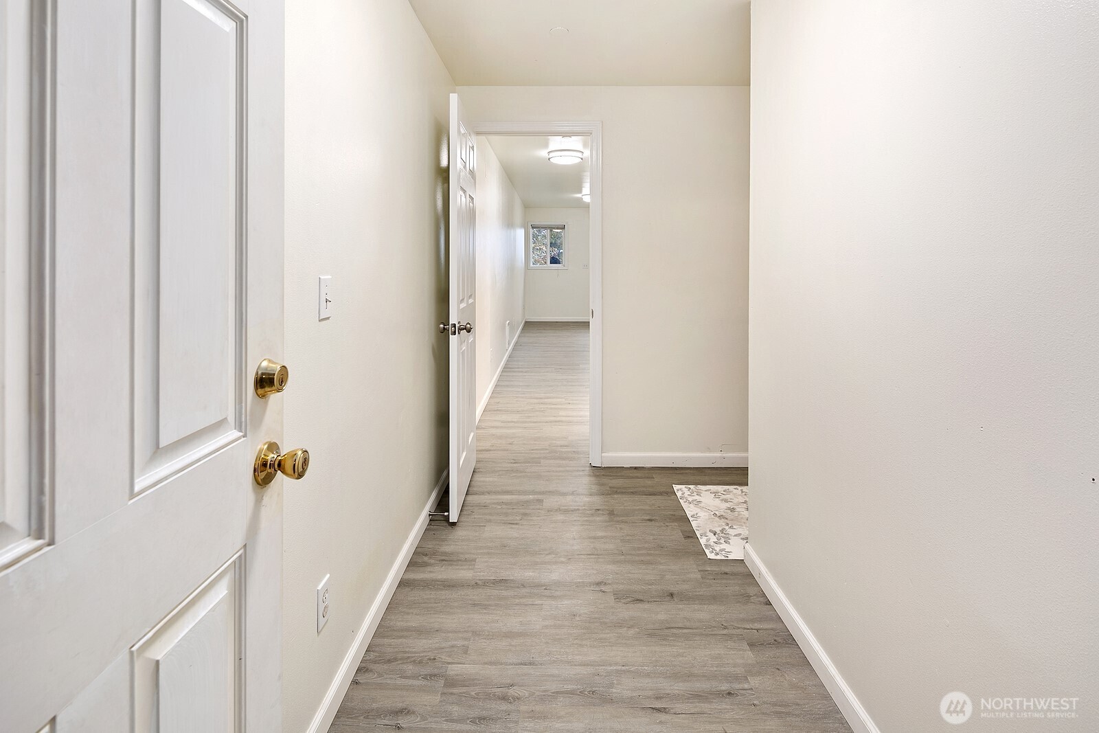 1701 16th Avenue South, Unit C Seattle, WA 98144 - Photo 9 of 27 a view of a hallway with wooden floor