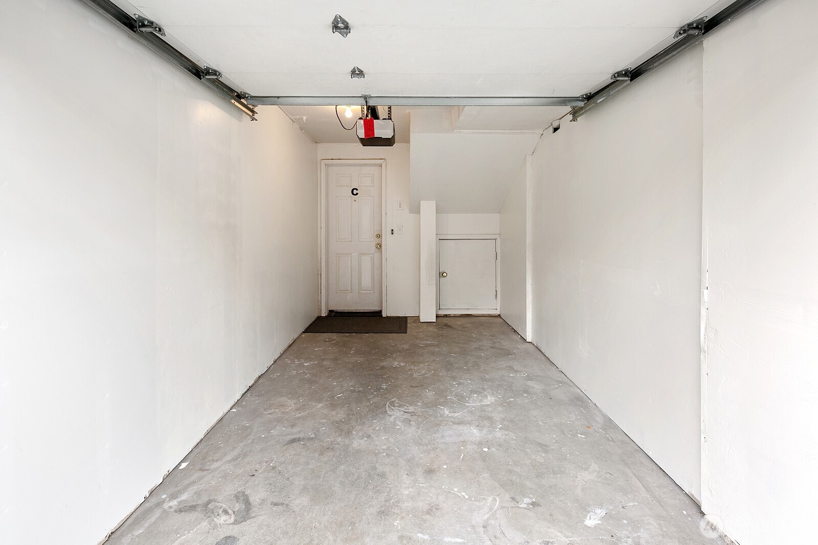 1701 16th Avenue South, Unit C Seattle, WA 98144 - Photo 10 of 27 an empty room with a windows and ceiling fan