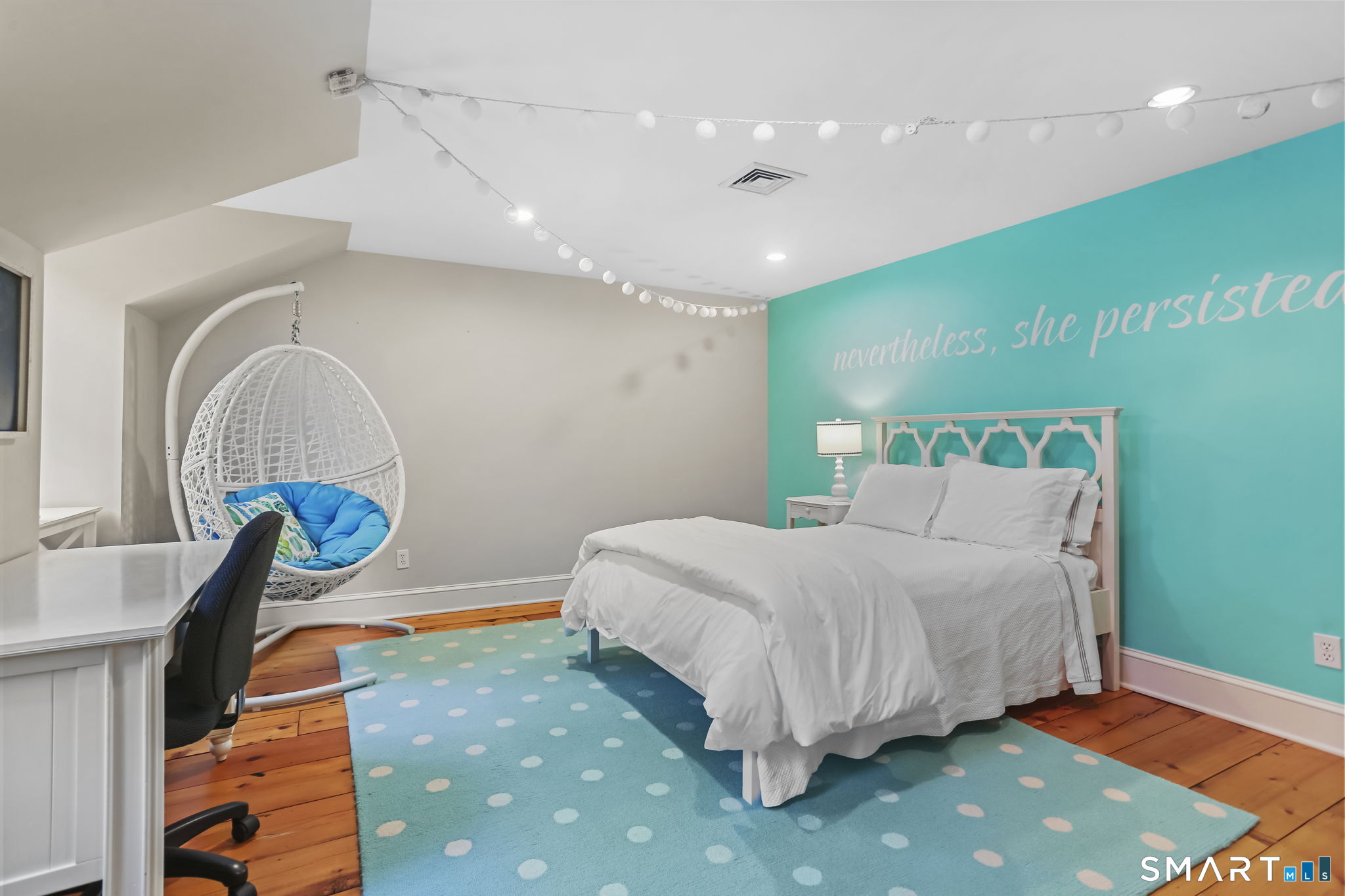 23 Old Stage Coach Road Weston, CT 06883 - Photo 23 of 37 a bedroom with a bed a table and potted plants