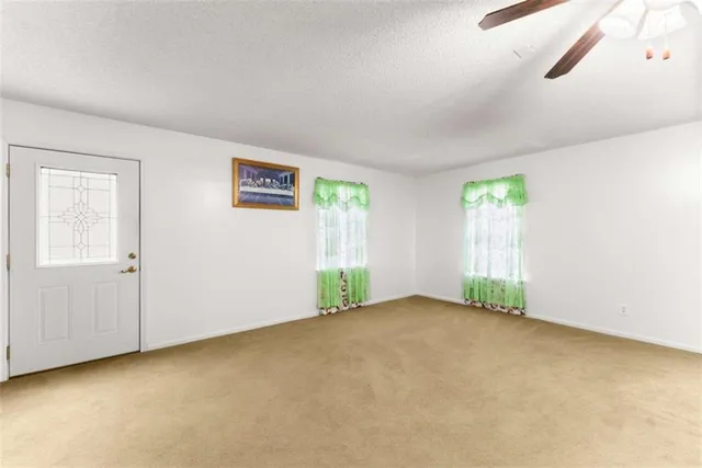 an empty room with windows