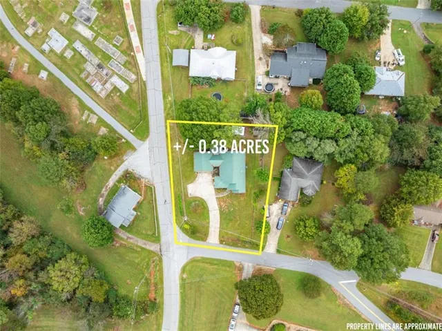 a sign that is on the side of the tree