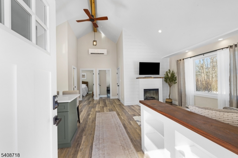 8 Worthington Road Newton, NJ 07860 - Photo 2 of 25 a living room with fireplace furniture and a flat screen tv