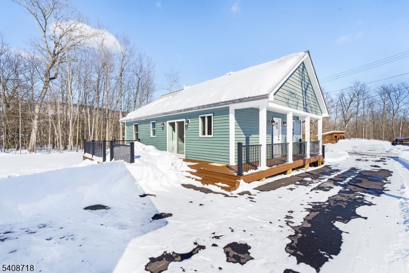8 Worthington Road Newton, NJ 07860 - Photo 23 of 25 a view of a house with snow on the road