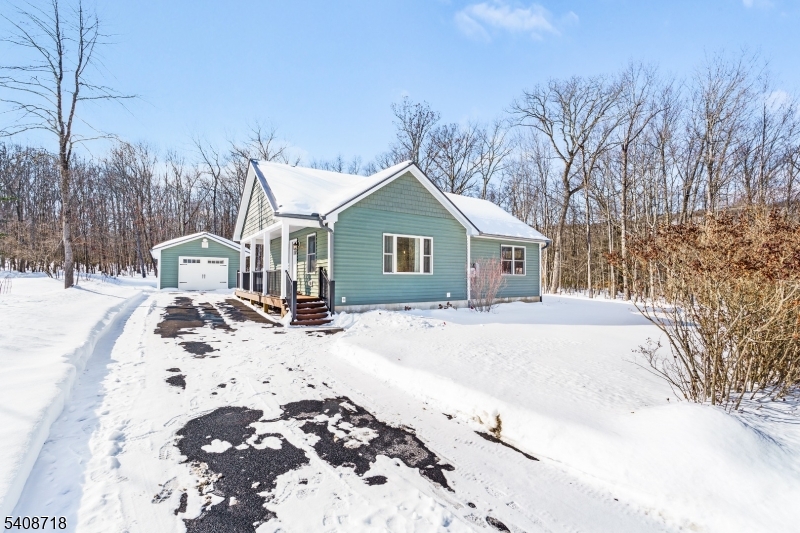 8 Worthington Road Newton, NJ 07860 - Photo 25 of 25 a view of house with yard covered in snow