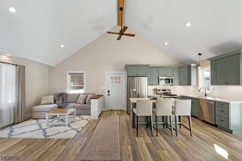 8 Worthington Road Newton, NJ 07860 - Photo 6 of 25 a large kitchen with a table and chairs in it