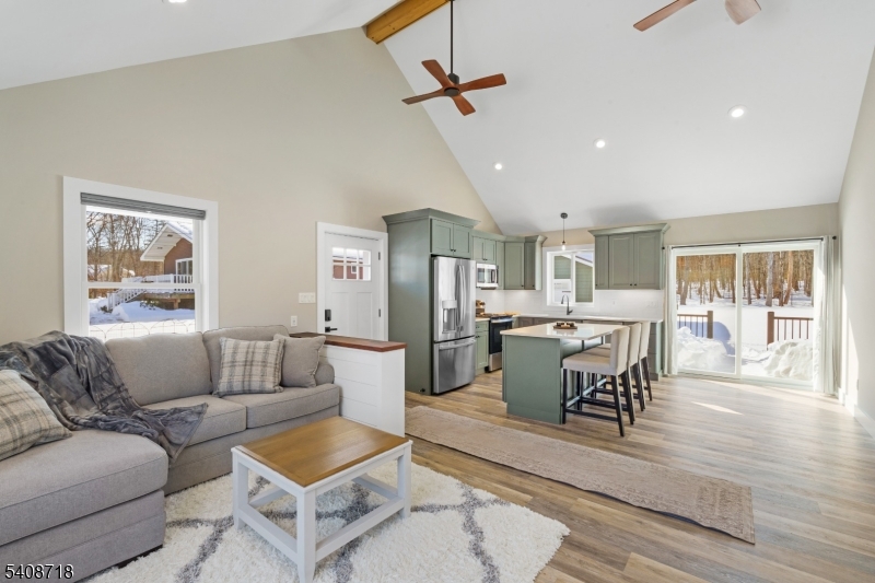 8 Worthington Road Newton, NJ 07860 - Photo 8 of 25 a living room with furniture and a wooden floor