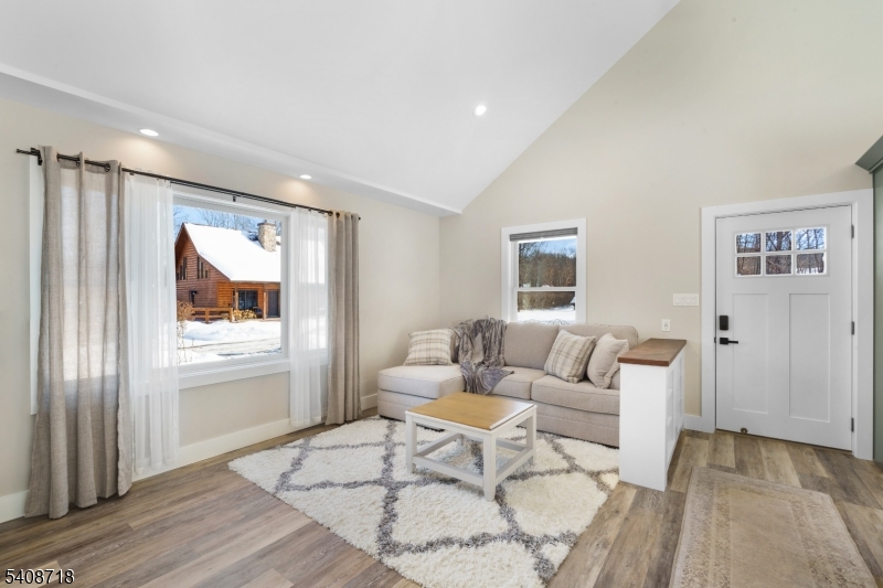 8 Worthington Road Newton, NJ 07860 - Photo 9 of 25 a living room with furniture and a window