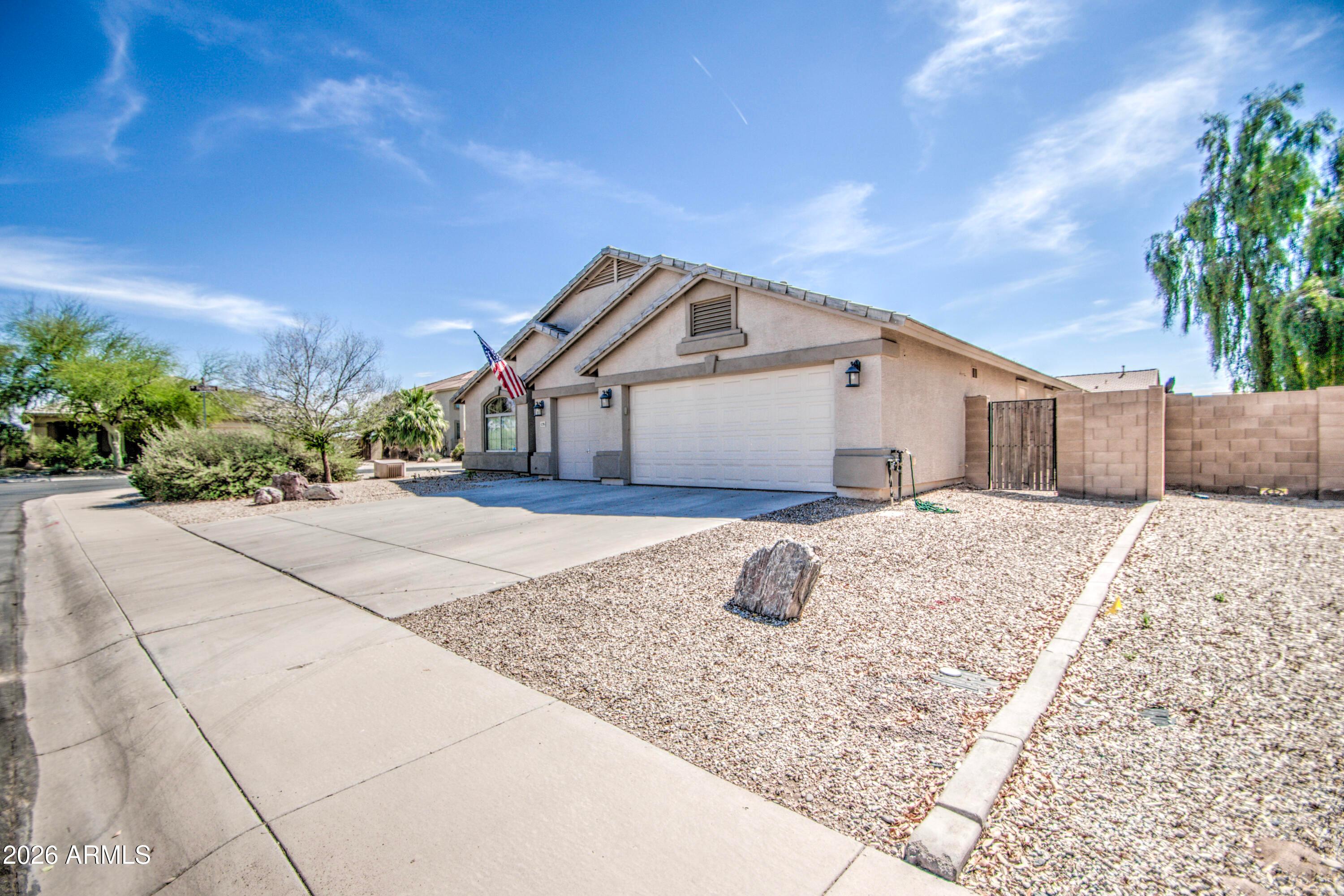 43205 Roth Road Maricopa, AZ 85138 - Photo 2 of 44 a house with a outdoor space