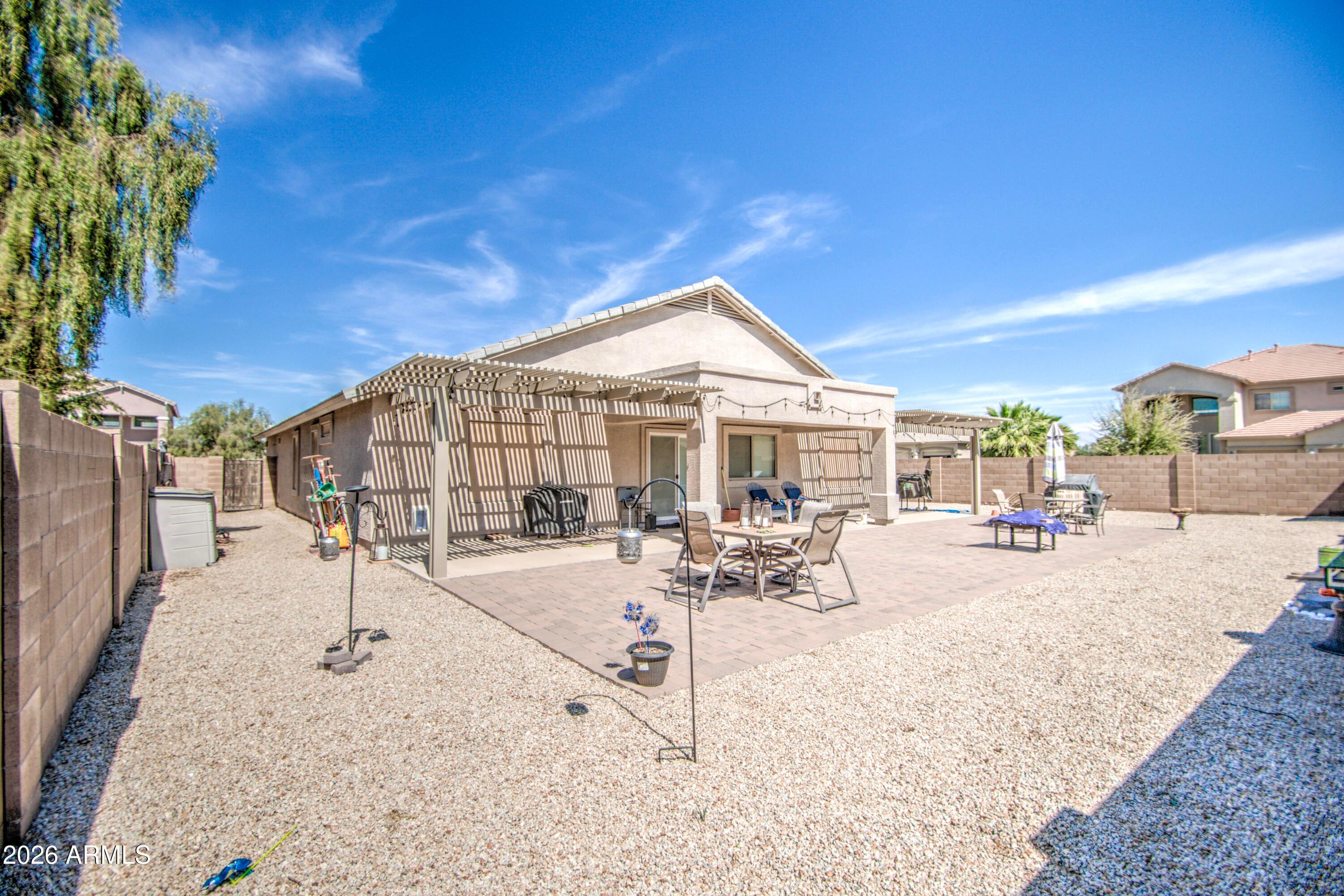 43205 Roth Road Maricopa, AZ 85138 - Photo 36 of 44 a view of a backyard with sitting area