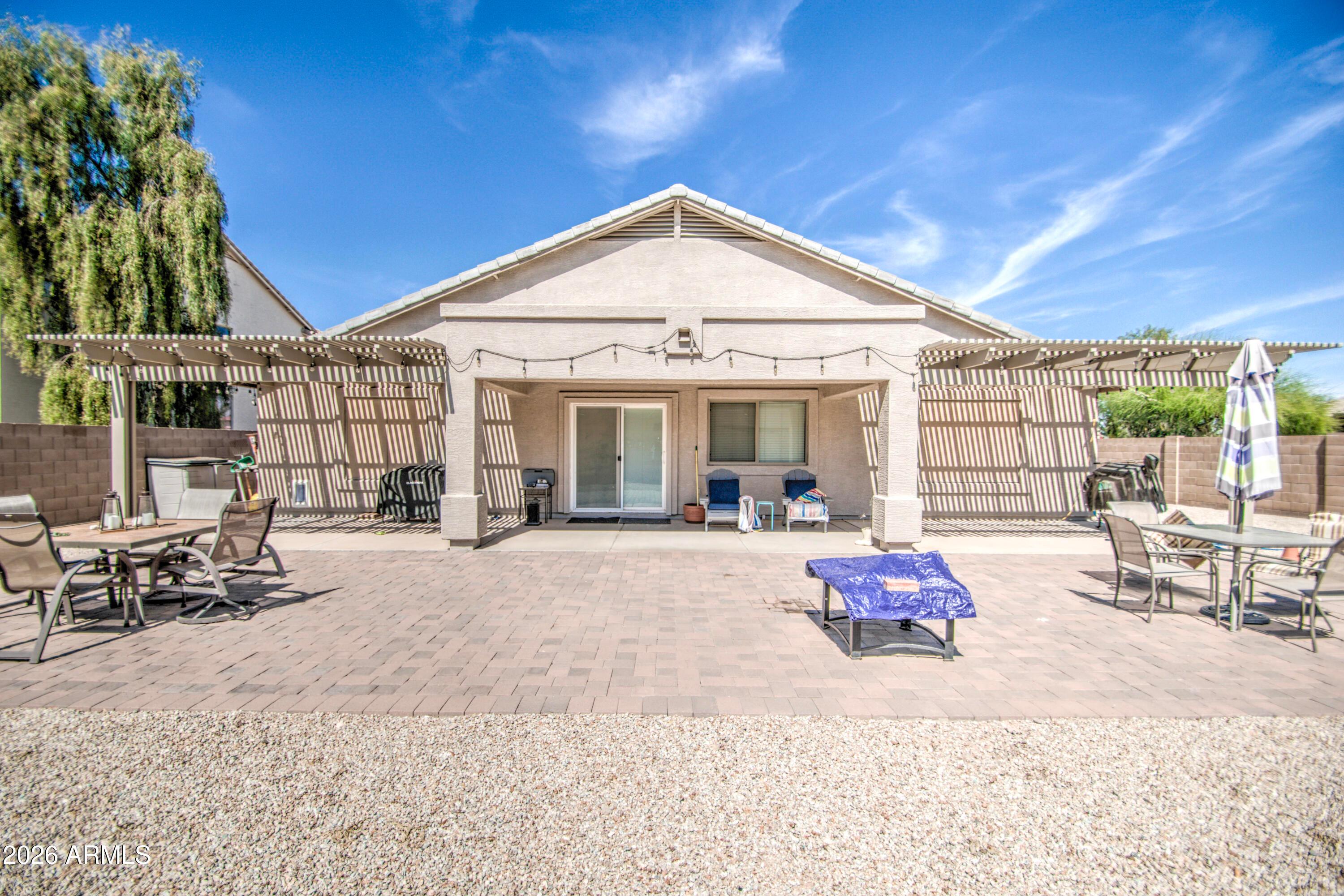 43205 Roth Road Maricopa, AZ 85138 - Photo 37 of 44 a front view of a house with patio