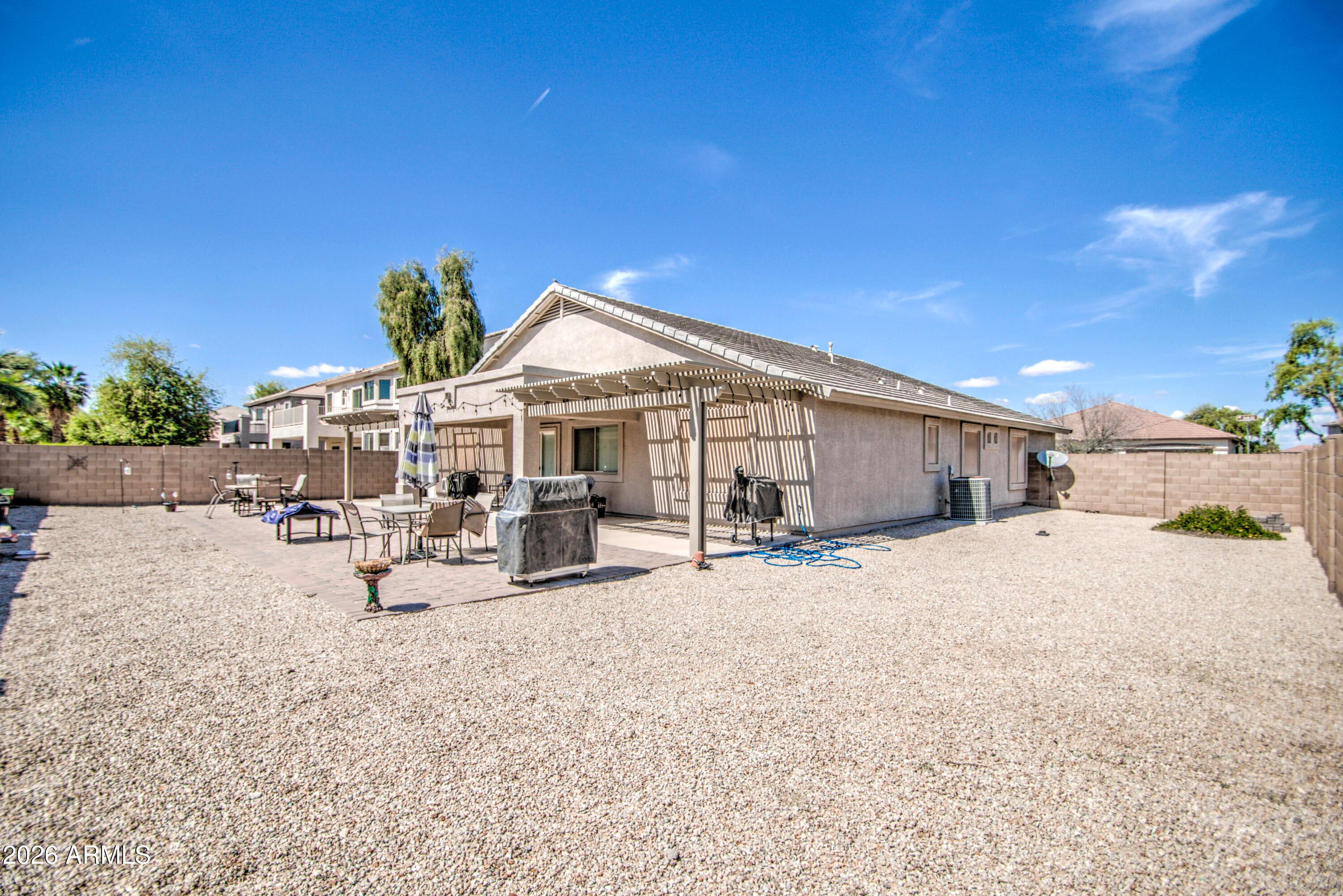 43205 Roth Road Maricopa, AZ 85138 - Photo 38 of 44 a view of a house with outdoor space and sitting area