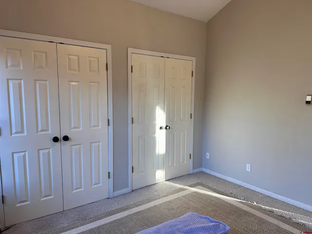 a kitchen with a stove and a refrigerator