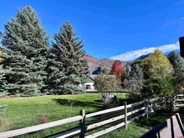 a view of a bench in a garden