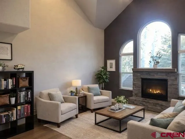 a kitchen with kitchen island granite countertop wooden cabinets and stainless steel appliances