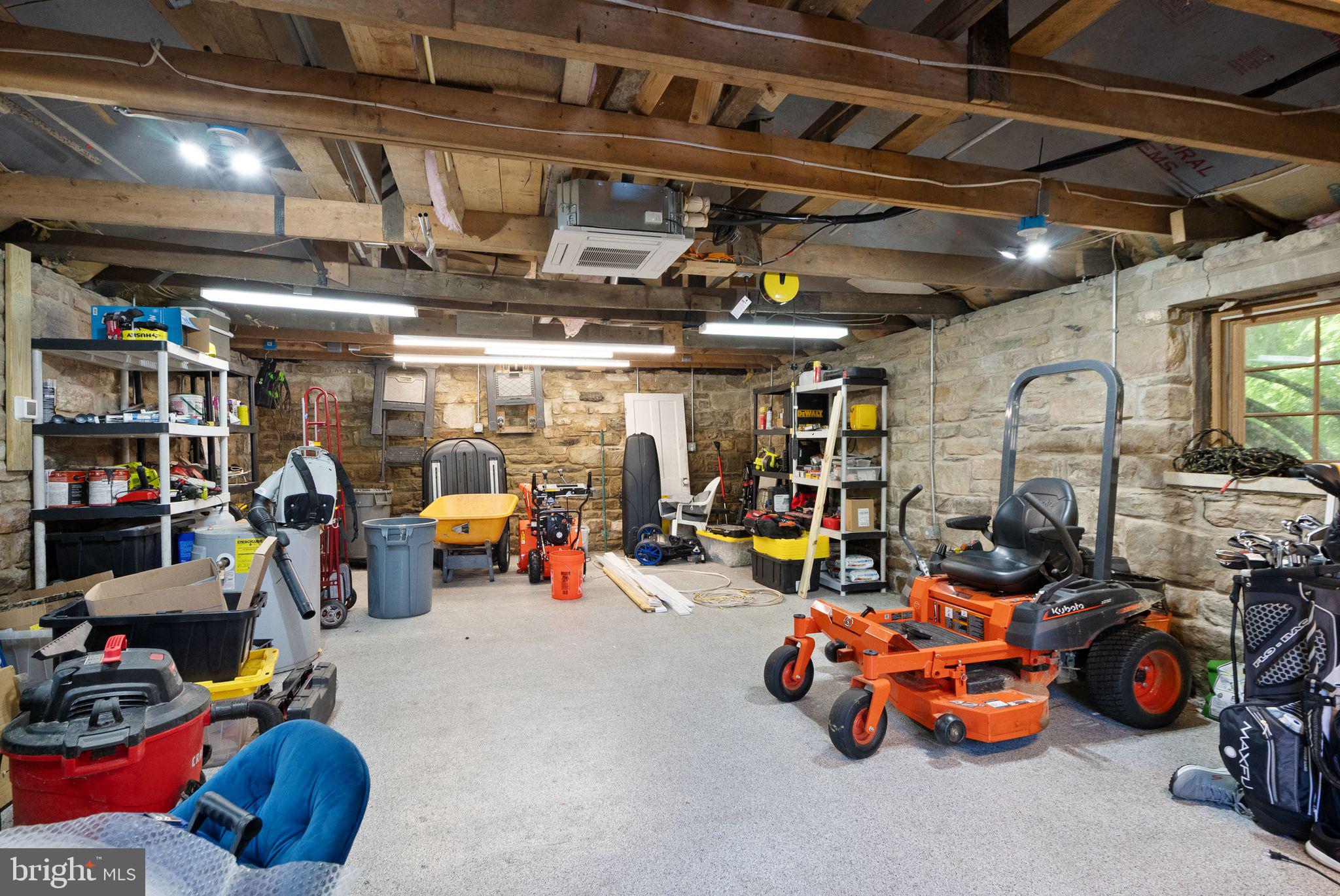 37151 Branchriver Road Purcellville, VA 20132 - Photo 51 of 63 a view of a garage with a car and car