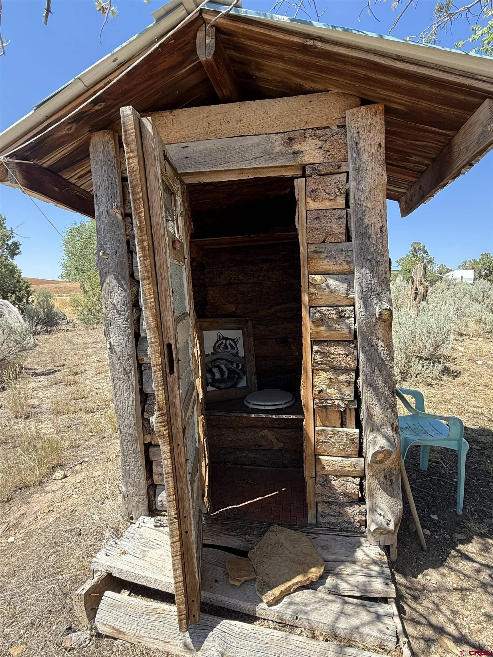 12730 Rd R Cahone, CO 81320 - Photo 27 of 34 a front view of a house with a door