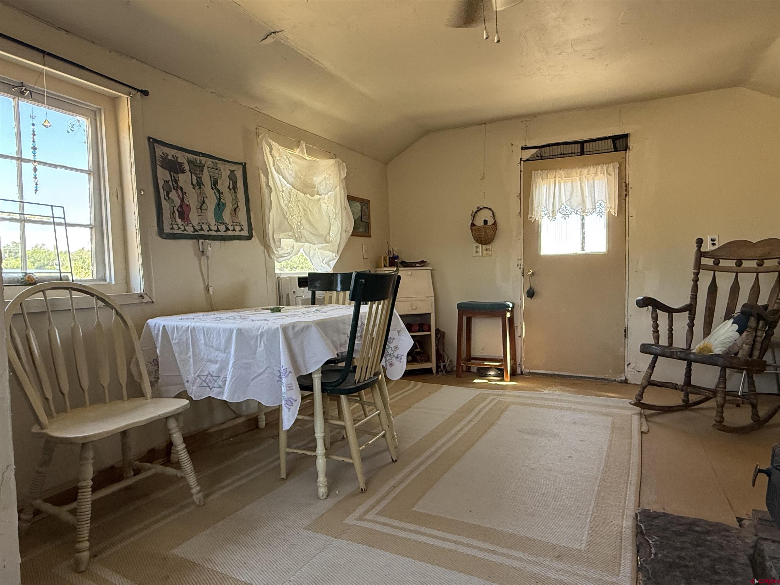 12730 Rd R Cahone, CO 81320 - Photo 6 of 34 a view of a livingroom with furniture and windows