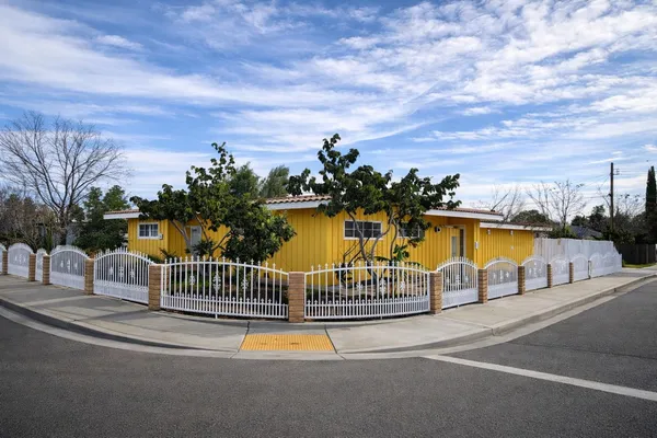 a view of swimming pool with seating space and deck in the back