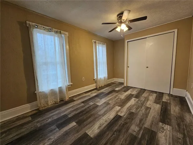 a view of a livingroom with a hardwood floor