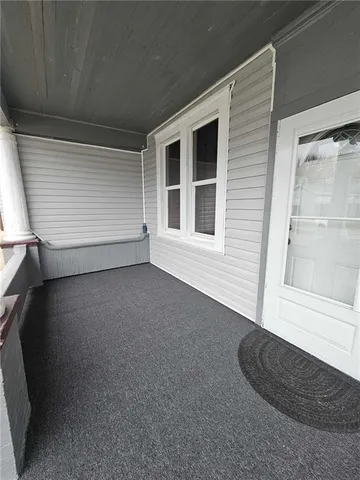 a view of a livingroom with a staircase