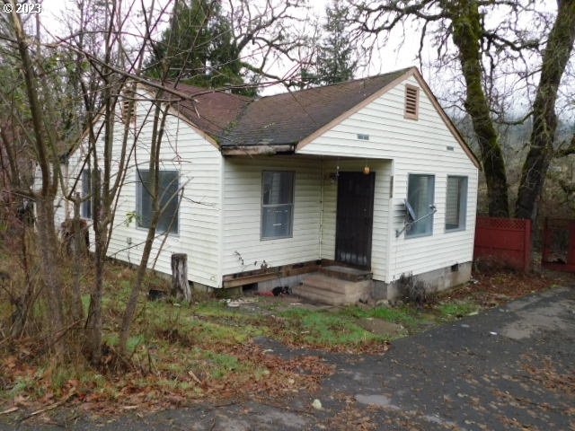 36874 Wallace Creek Road Springfield, OR 97478 - Photo 1 of 18 a view of a house with a yard and tree