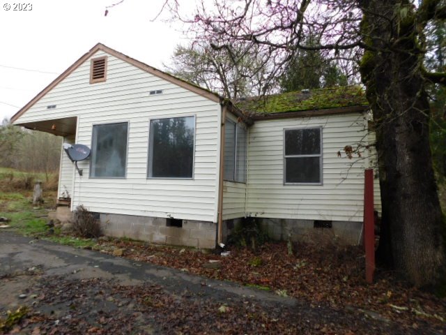 36874 Wallace Creek Road Springfield, OR 97478 - Photo 18 of 18 a view of a house with a yard