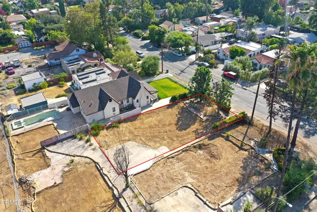an aerial view of a swimming pool