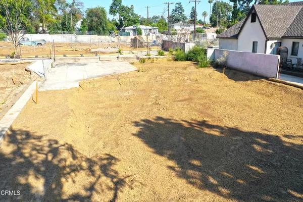 a view of backyard of a house