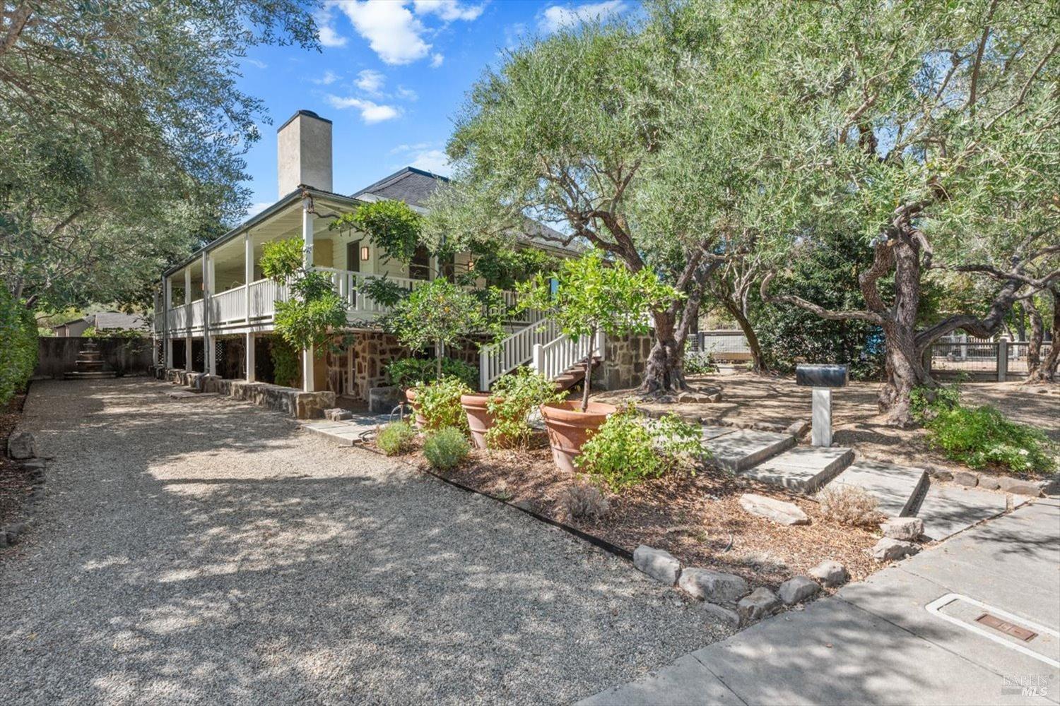 1533 Allyn Avenue St. Helena, CA 94574 - Photo 1 of 33 a front view of a house with garden