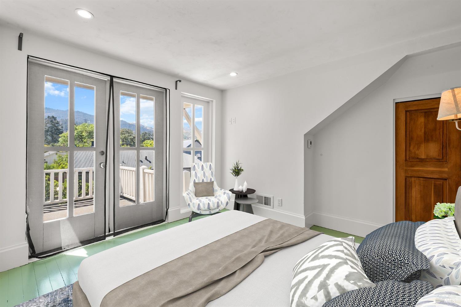 1533 Allyn Avenue St. Helena, CA 94574 - Photo 14 of 33 a bedroom with a large bed and a large window