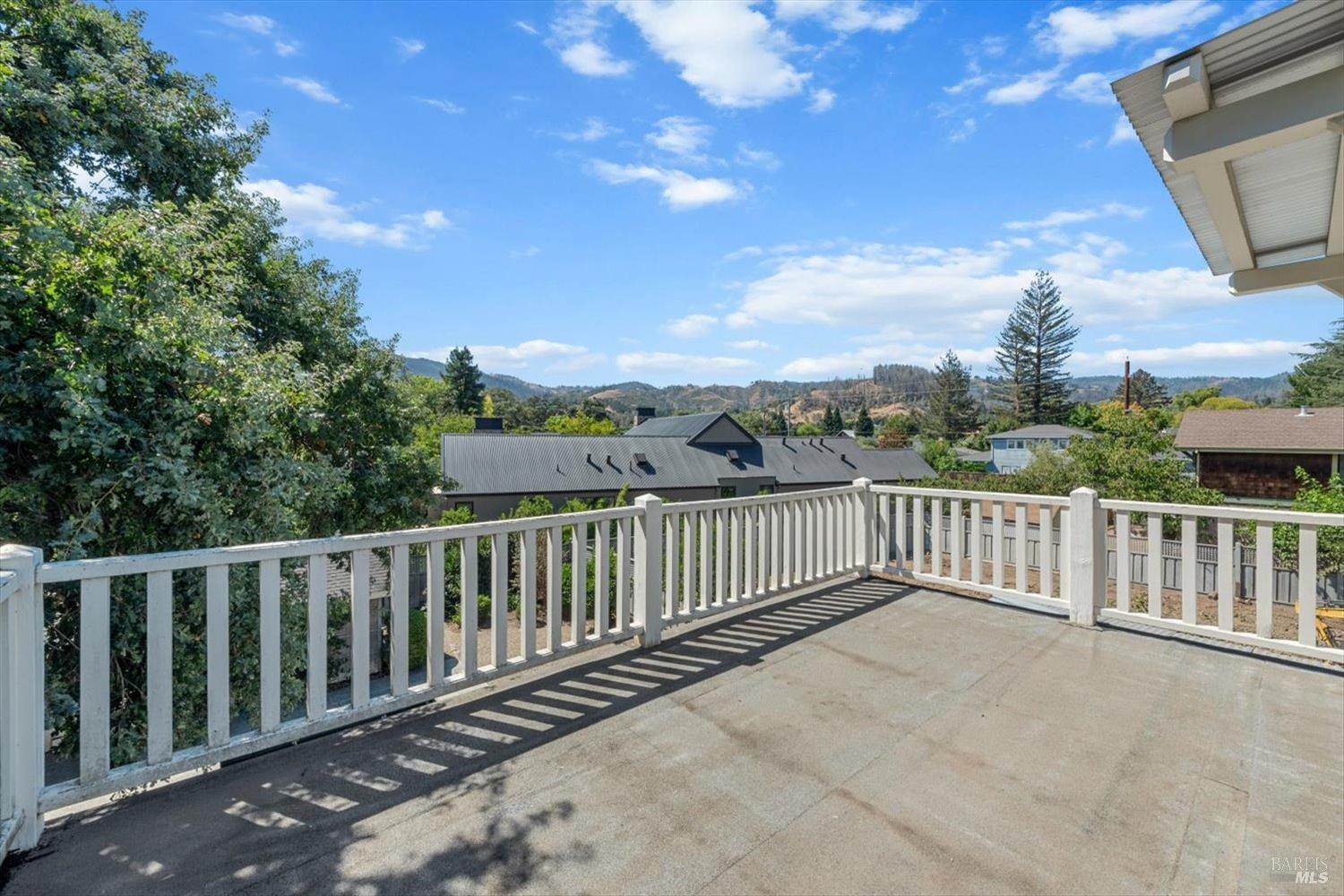 1533 Allyn Avenue St. Helena, CA 94574 - Photo 16 of 33 a view of a balcony with wooden fence and floor