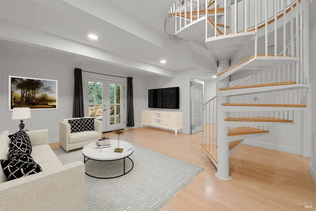 a living room with a couch and a flat screen tv