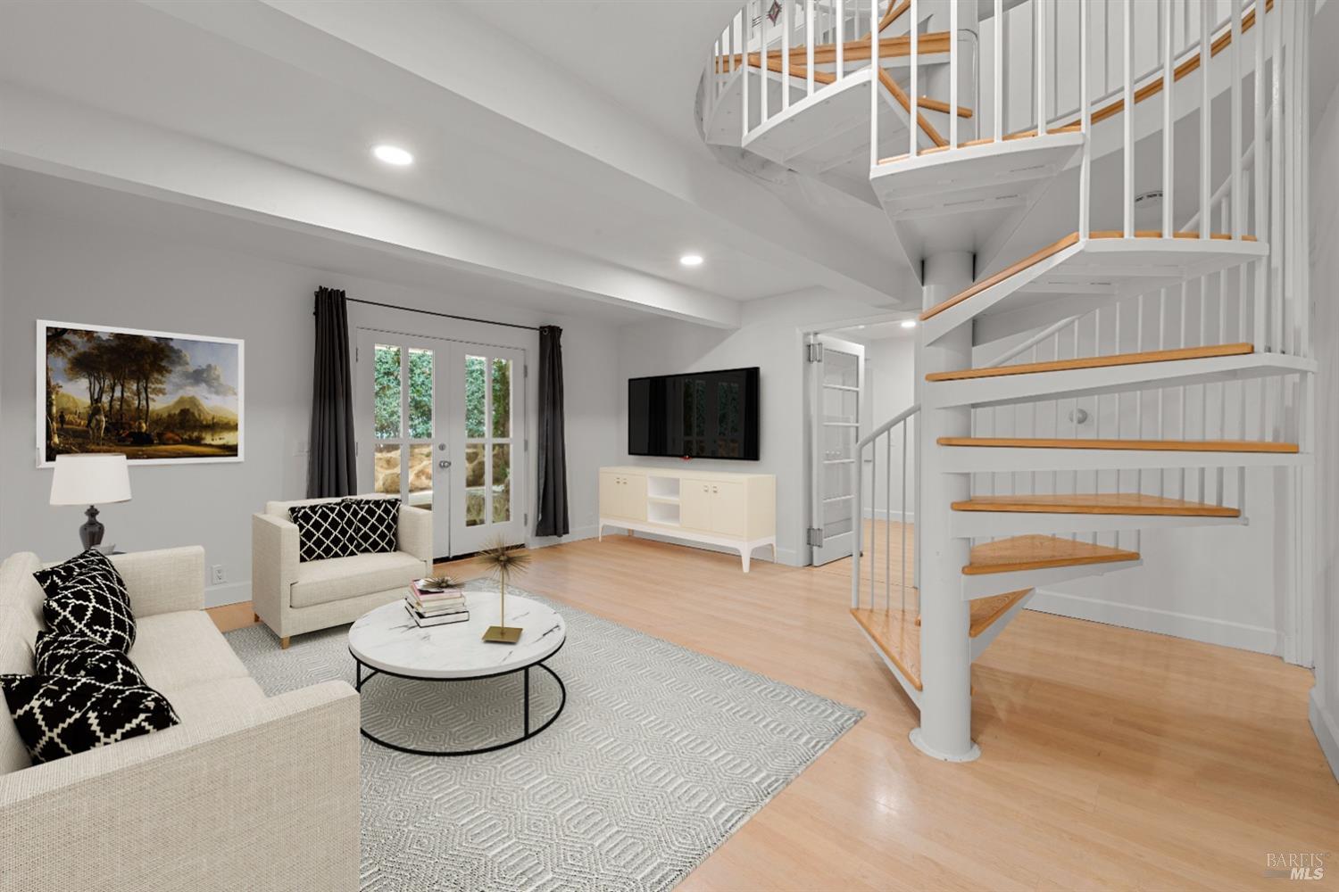 1533 Allyn Avenue St. Helena, CA 94574 - Photo 17 of 33 a living room with a couch and a flat screen tv