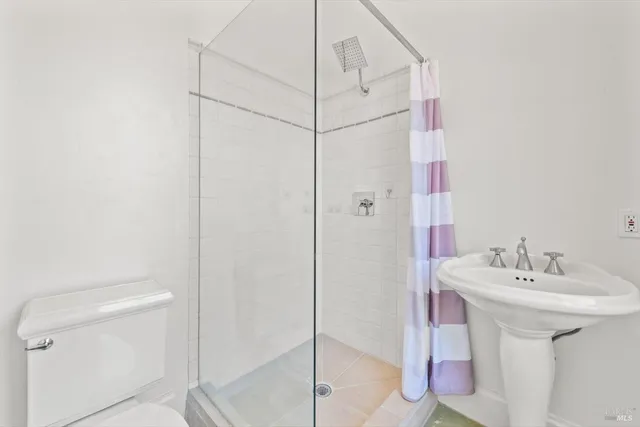 a bathroom with a sink and mirror