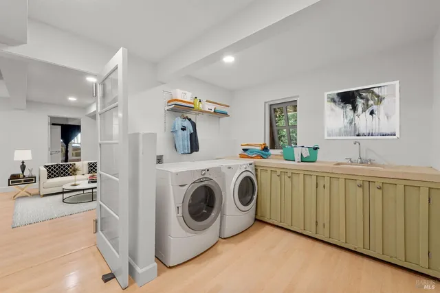 a utility room with dryer and washer