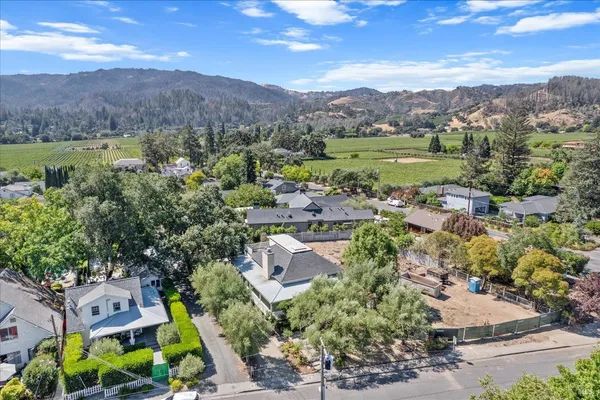 an aerial view of residential house and outdoor space