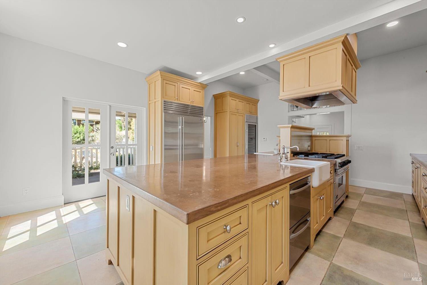 1533 Allyn Avenue St. Helena, CA 94574 - Photo 5 of 33 a kitchen with stainless steel appliances granite countertop a sink and a stove