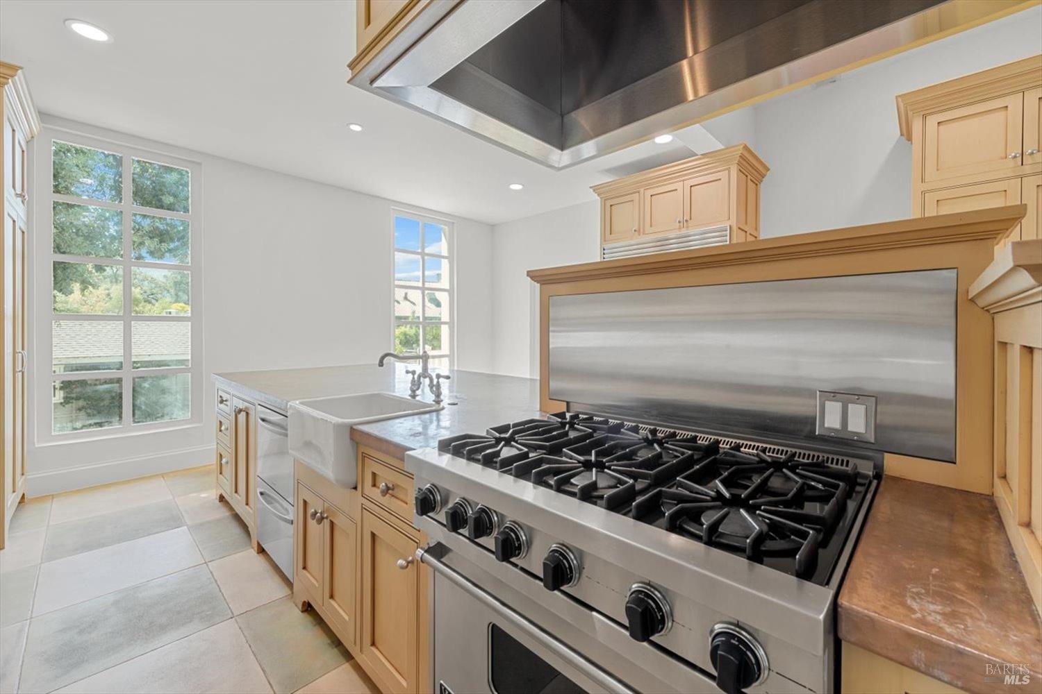 1533 Allyn Avenue St. Helena, CA 94574 - Photo 6 of 33 a kitchen with stove and cabinets