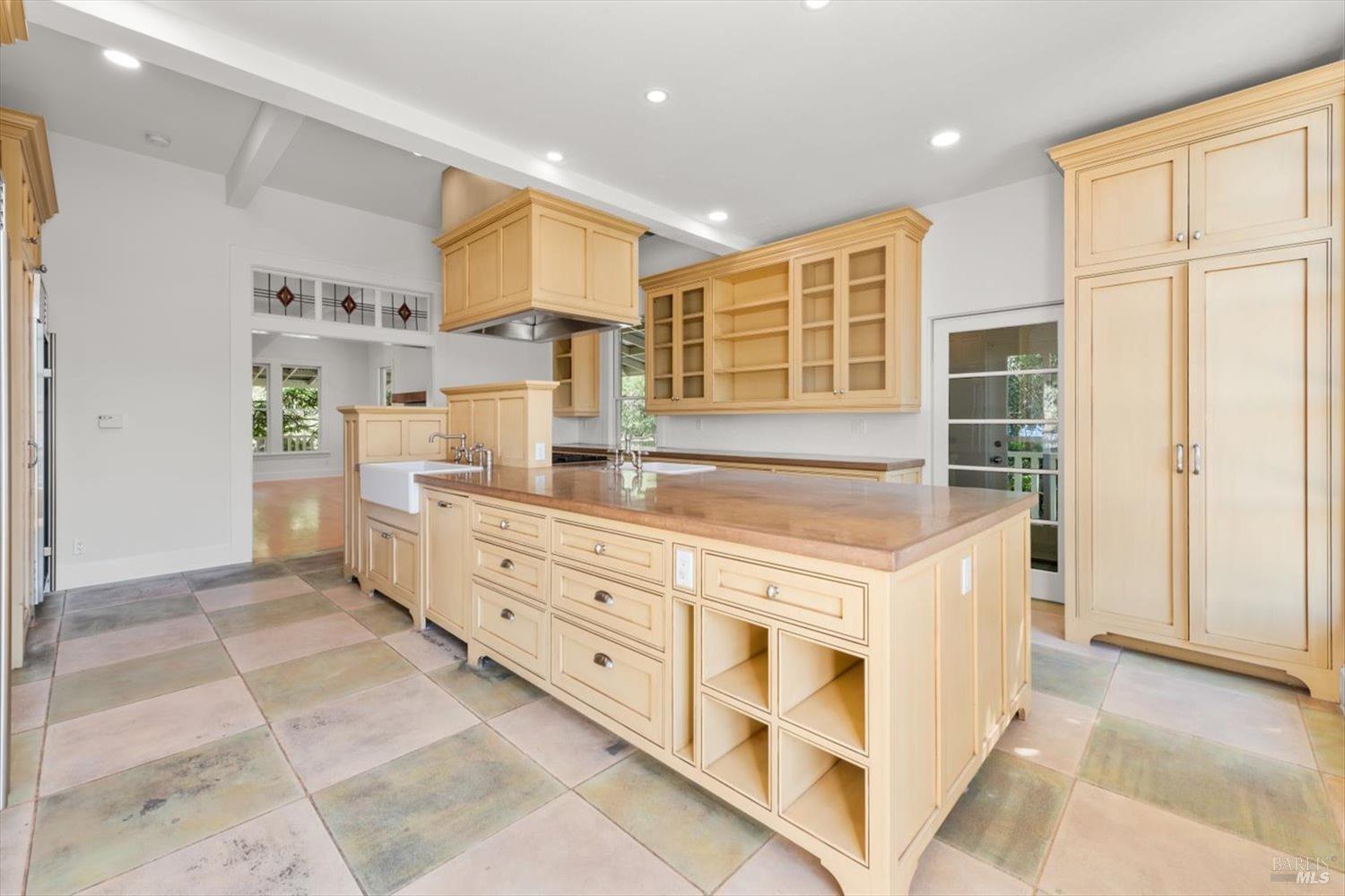 1533 Allyn Avenue St. Helena, CA 94574 - Photo 8 of 33 a kitchen with cabinets and window