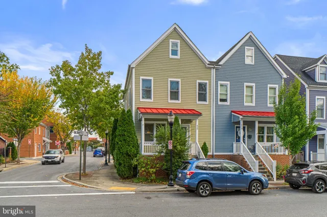 a car parked in front of a house