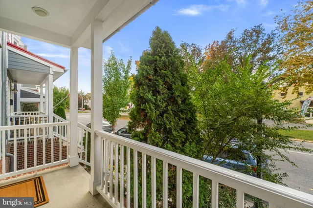 a view of a balcony with an outdoor space